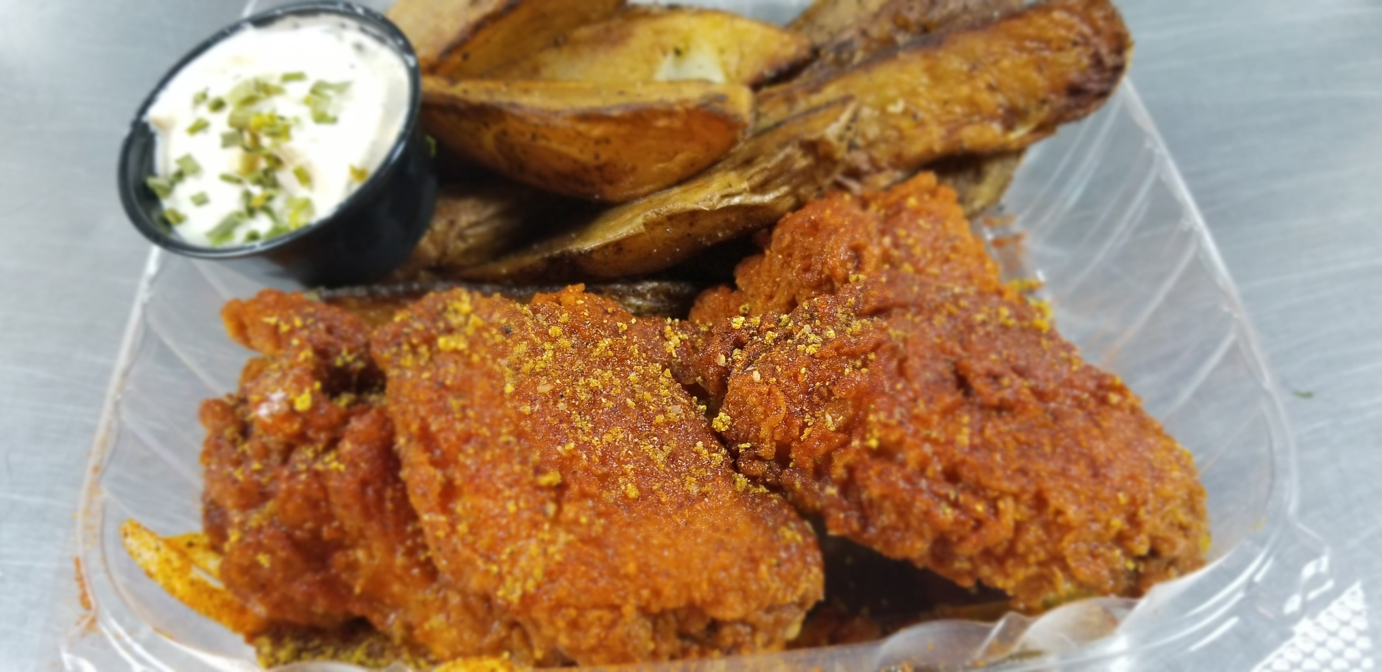 Sexy Red (spicy lemon pepper sauce) Trap House Chicken